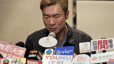 Andy Hui apologizes after taxi camera captures infidelity