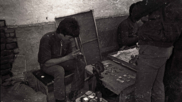 Nostalgia: Street shop for refilling lighter-gas and repairing watches