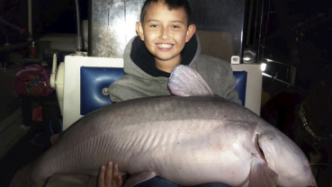 9-year-old boy catches massive blue catfish in New Mexico