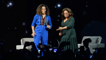 Michelle Obama, Oprah Winfrey headline arena like rock stars