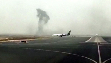 Emirates airliner with 300 onboard crash lands in Dubai