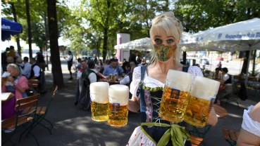 Kegs tapped in Munich pubs for mini-Oktoberfest in shadow of COVID-19