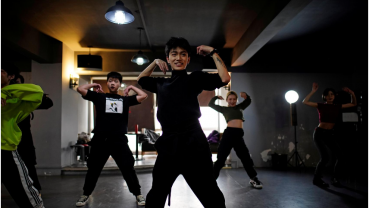 Wuhan's vogue dancers embrace new freedom as COVID-19 anniversary nears