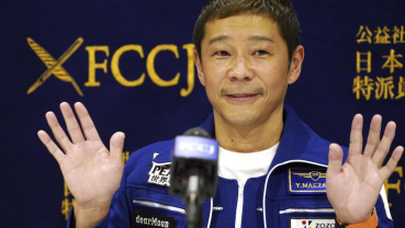 Japan tycoon Maezawa returns from space with business dreams