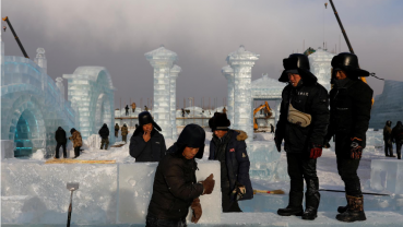 China 'mines' ice from river to build frozen castles, pagoda