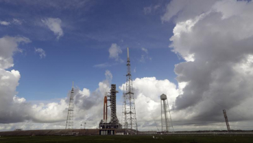 NASA presses toward moon rocket launch after fuel leak