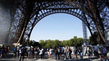 Eiffel Tower reopens, ending 104-day coronavirus shutdown