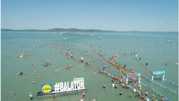 Thousands dive into balmy Lake Balaton in Hungary for swimming contest
