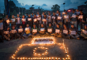 Candles lit to pay tribute to journalists killed in Kabul attack (With photos)