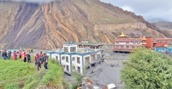 What caused the unprecedented flood in Mustang?