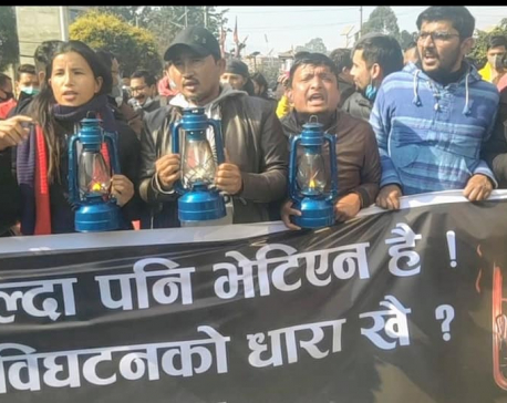 Students close to Dahal-Nepal faction stage lantern demonstration against House dissolution