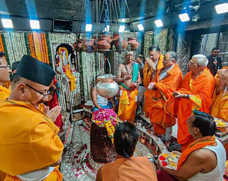 Sharing a photo of PM Dahal worshiping in the temple in India, Dr Baburam Bhattarai asks: “Where are we going?”