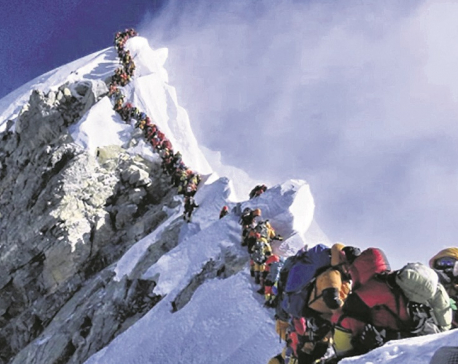 Sherpas fixing two ropes to ease Everest traffic jam