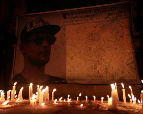 Candles lit to commemorate rapper Yama Buddha  (photo feature)