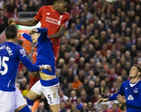 Liverpool routs Everton 4-0 but striker Origi is carried off