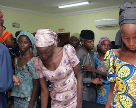 Nigerian parents reunite with 21 girls freed by Boko Haram