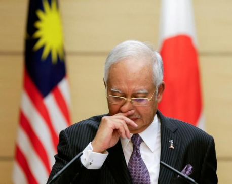 Thousands march in Malaysian capital calling for PM Najib to step down