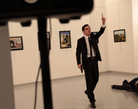 Invoking Syria, policeman kills Russian ambassador to Turkey