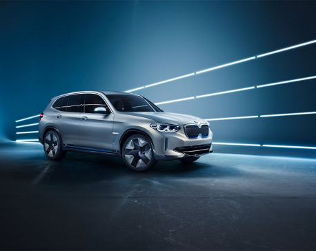 BMW just unveiled a sleek electric SUV that will take on Tesla's Model X