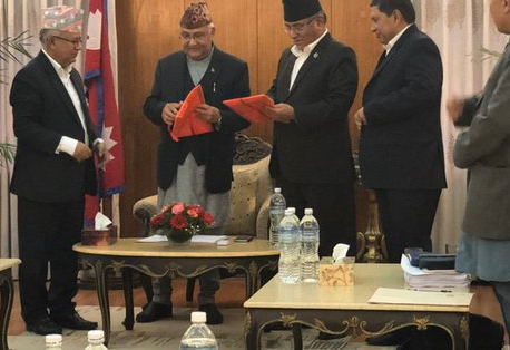 Oli, Dahal to work together to resolve disputed issues