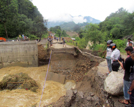 Flood damages bridge, afflicting people including Gosaikunda pilgrims