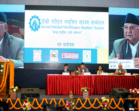 PM Oli urges microfinance institutions to invest in remote areas