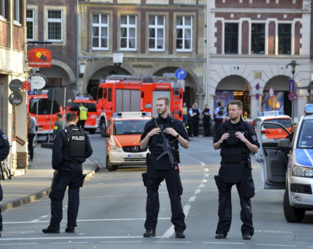 Germany seeks motive after van crashes into crowd, killing 2