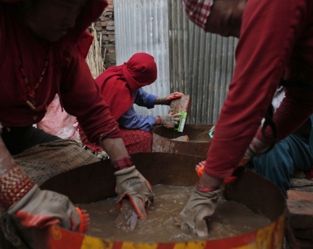 Tired of the cold wait, Nepal quake survivors rebuild