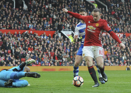Rooney equals record as United beats Reading 4-0 in FA Cup