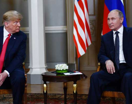 Trump sits down with Putin after denouncing past U.S. policy on Russia