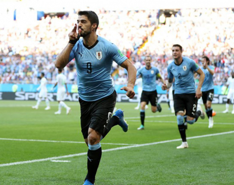 Uruguay beat Saudi Arabia to send themselves and Russia into last 16