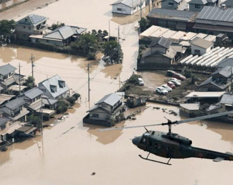 Japan flood toll nears 200, sun scorches thousands battling thirst