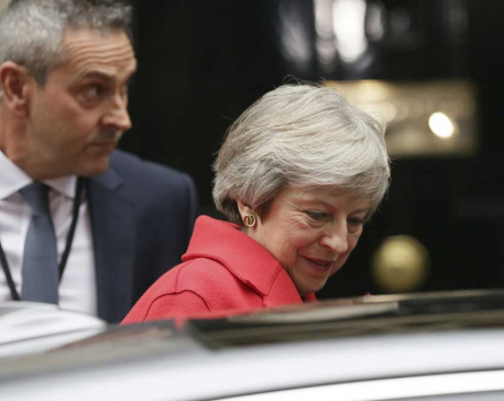 Wounded May seeks EU compromise to save Brexit deal