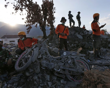 Indonesia raises death toll from quake, tsunami to 1,558