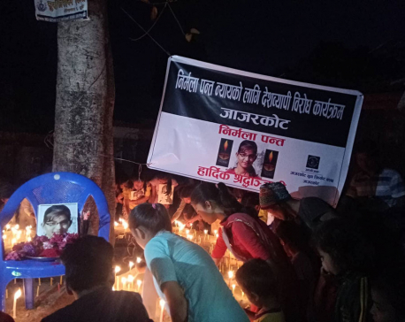 Candles lit demanding justice for Nirmala