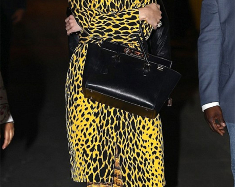 Katy Perry flaunts wild side in cheetah jacket and snakey leggings
