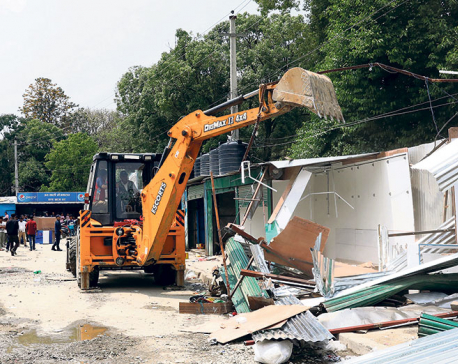 KMC bulldozes 52 illegally-built structures at Khulla Manch