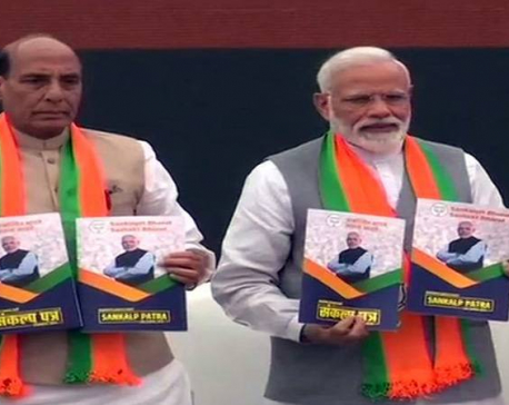 In run-up to Lok Sabha elections, India's ruling BJP unveils its election manifesto