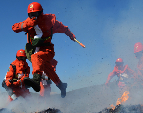 30 firefighters and volunteers die fighting forest fire in China