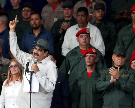 Venezuela's Maduro orders militia expansion as Guaido tours blackout-ravaged state