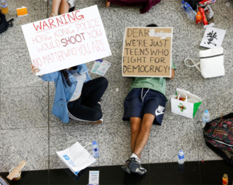 Hong Kong airport reopens amid warnings over pro-democracy protests
