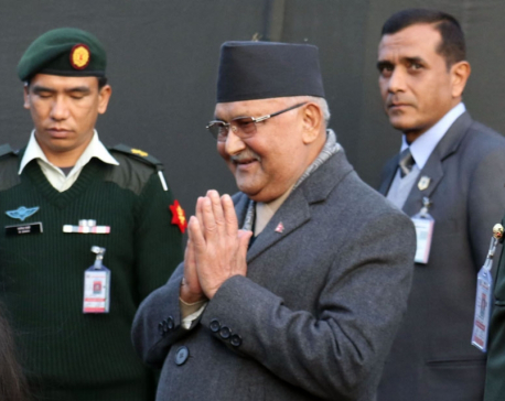 PM  Oli returns home from Singapore