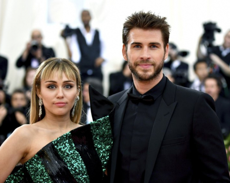 Cyrus and Hemsworth split after less than year of marriage