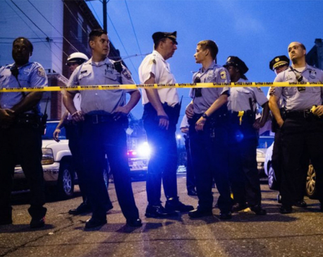 Gunman wounds at least 6 Philadelphia police; 2 others freed
