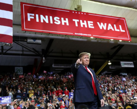 Trump vows emergency declaration over wall, agrees to shutdown-averting bill