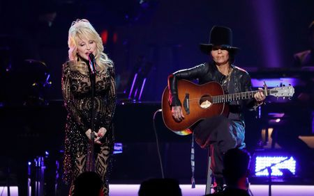Country singer Dolly Parton raises laughs at charity awards gala