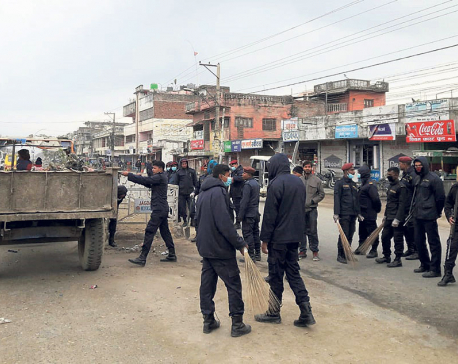 Police collect waste as municipal officials boycott work