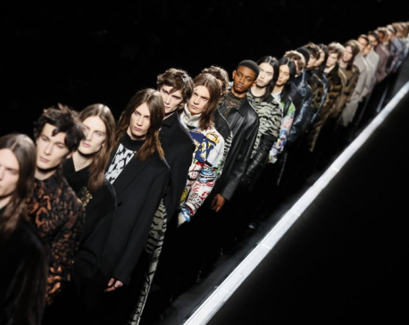 Dior pulls the stars in conveyor-belt menswear show in Paris