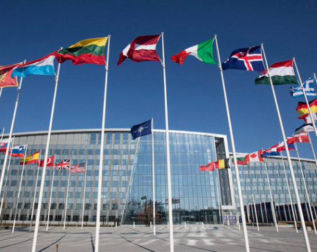 NATO defense ministers approve new space policy, discuss burden sharing