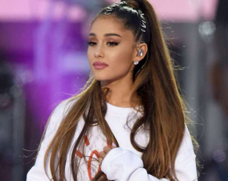 Ariana Grande tears up while paying tribute to her late ex-boyfriend